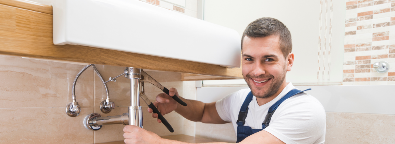 A professional repairing home plumbing